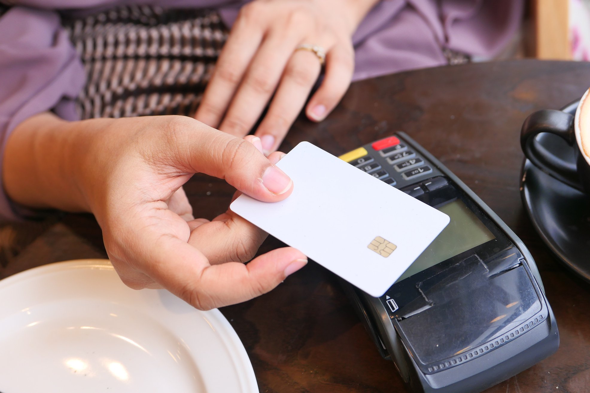 Payment Terminal Charging from a Card, Contactless Payment.